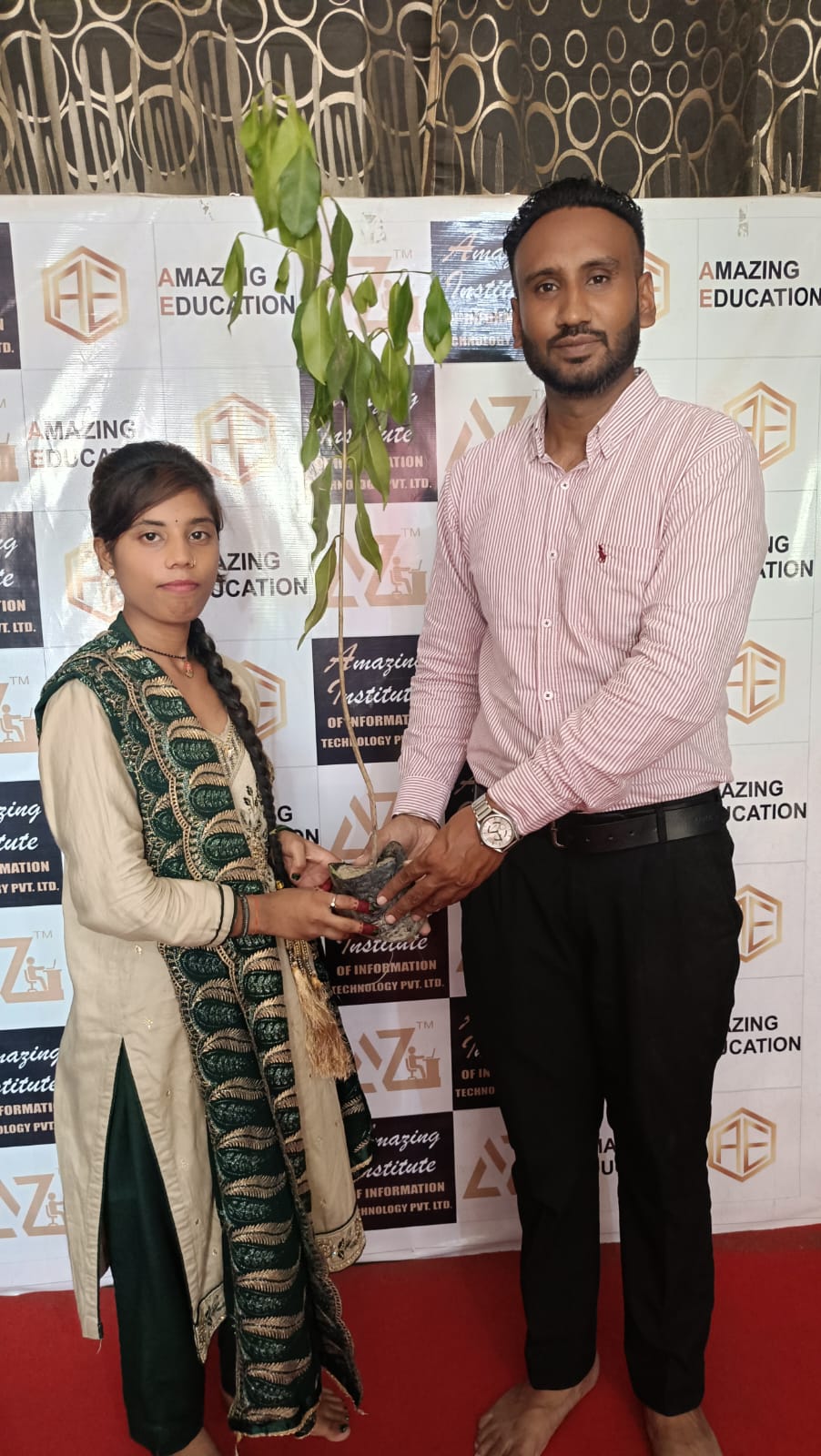GAVE A TREE TO THE STUDENT